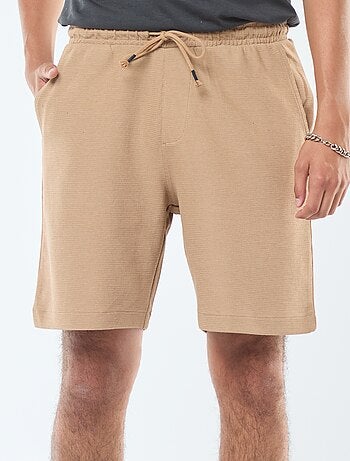 Short de sport avec poches en maille fantaisie