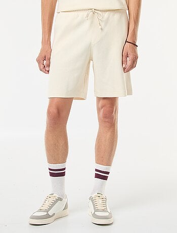 Short de sport avec poches en maille fantaisie