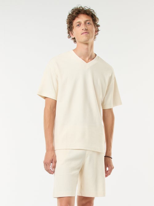 Short de sport avec poches en maille fantaisie - Kiabi