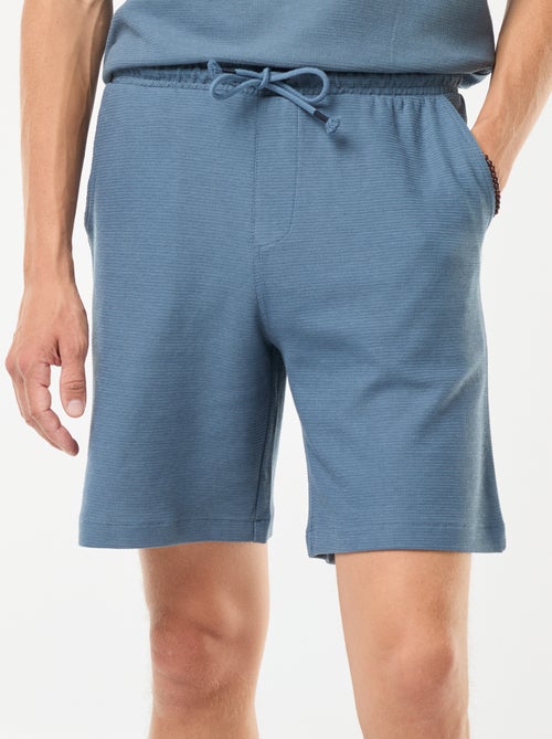 Short de sport avec poches en maille fantaisie - Kiabi