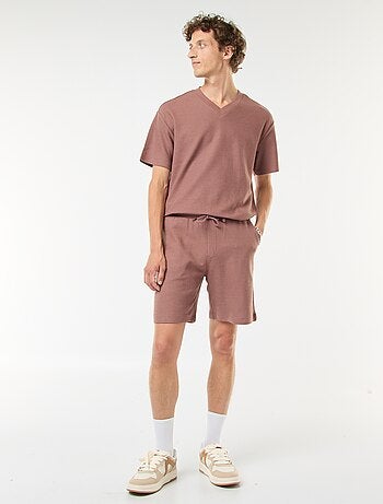 Short de sport avec poches en maille fantaisie