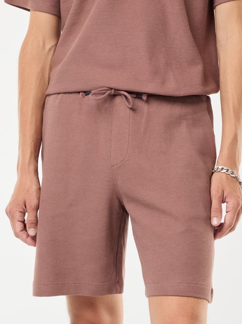 Short de sport avec poches en maille fantaisie - Kiabi