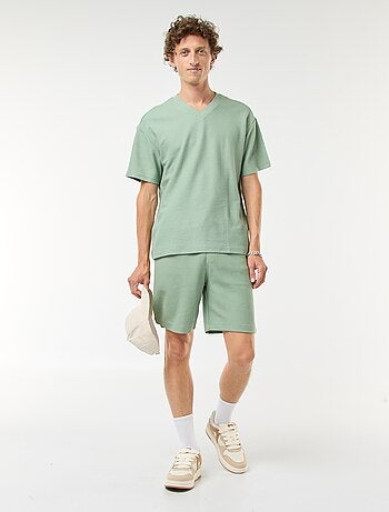 Short de sport avec poches en maille fantaisie