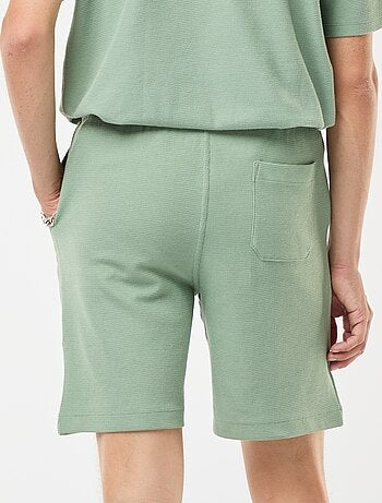 Short de sport avec poches en maille fantaisie