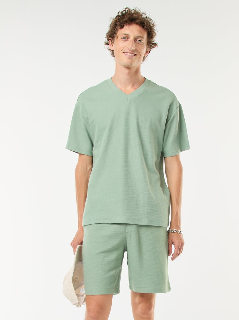 Short de sport avec poches en maille fantaisie Vert - Kiabi