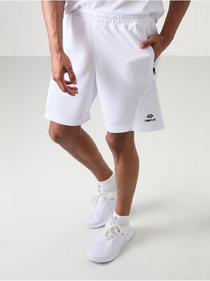 Short de survêtement homme à fermeture éclair tommy Blanc - Kiabi