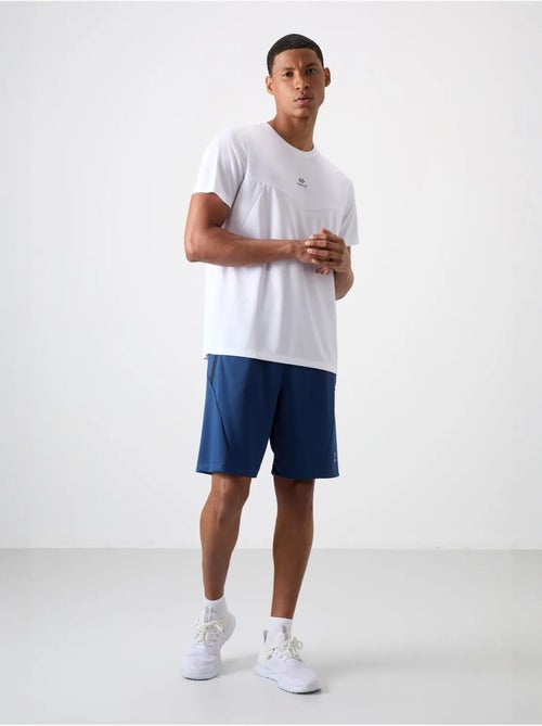 Short de survêtement homme à fermeture éclair tommy - Kiabi Short de survêtement homme à fermeture éclair tommy - Kiabi