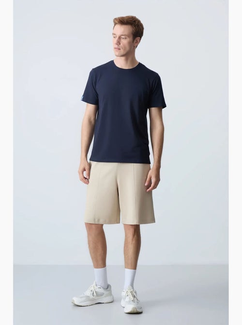 Short de survêtement homme en coton mélangé tommy - Kiabi Short de survêtement homme en coton mélangé tommy - Kiabi