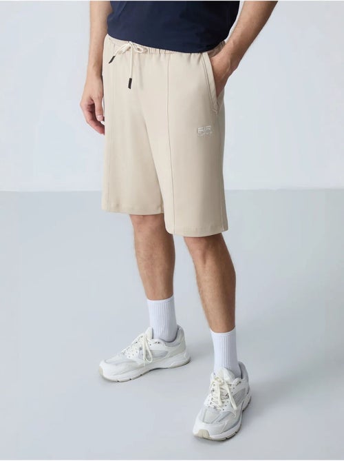 Short de survêtement homme en coton mélangé tommy - Kiabi Short de survêtement homme en coton mélangé tommy - Kiabi