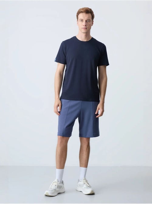 Short de survêtement homme en coton mélangé tommy - Kiabi Short de survêtement homme en coton mélangé tommy - Kiabi