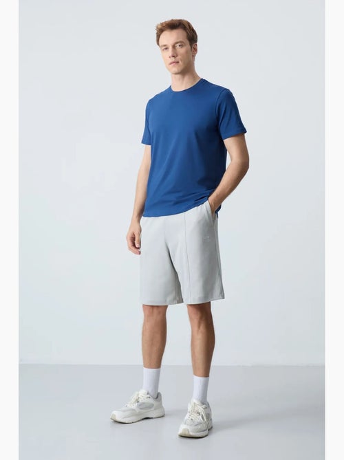 Short de survêtement homme en coton mélangé tommy - Kiabi Short de survêtement homme en coton mélangé tommy - Kiabi
