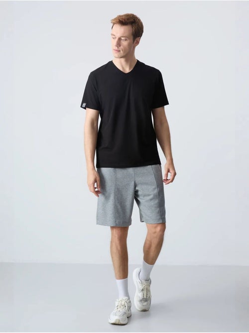 Short de survêtement homme en coton mélangé tommy - Kiabi Short de survêtement homme en coton mélangé tommy - Kiabi