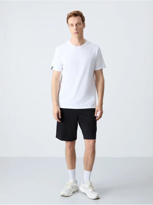 Short de survêtement homme en coton mélangé tommy - Kiabi Short de survêtement homme en coton mélangé tommy - Kiabi