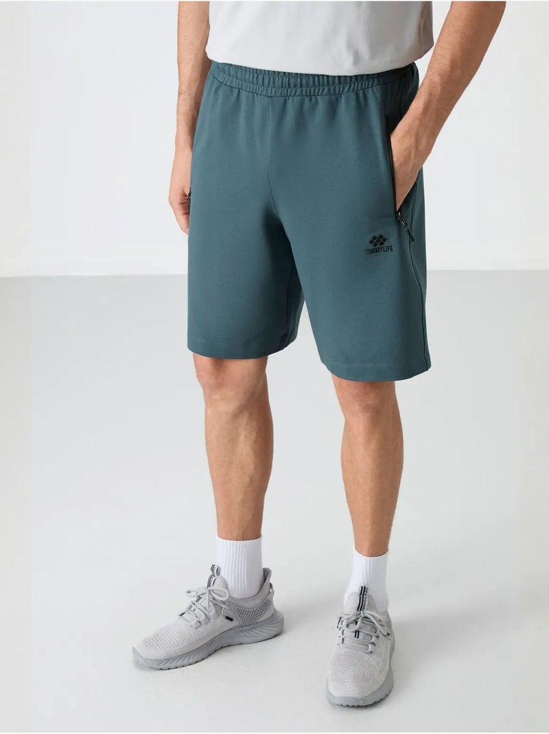 Short de survêtement homme en maille, coupe regular tommy Bleu canard - Kiabi