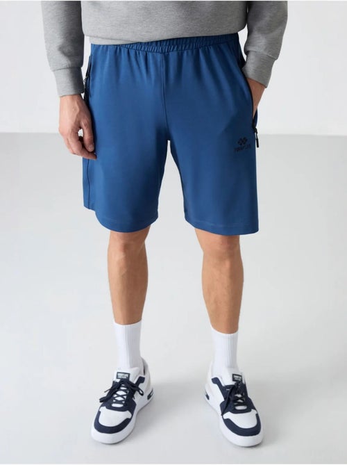 Short de survêtement homme en maille, coupe regular tommy - Kiabi Short de survêtement homme en maille, coupe regular tommy - Kiabi