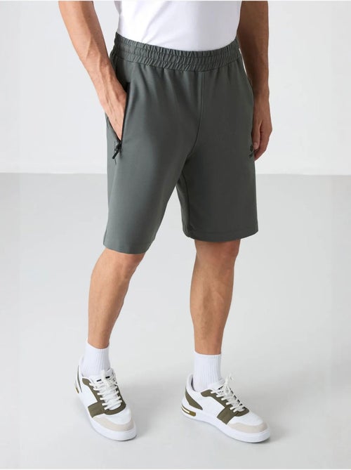 Short de survêtement homme en maille, coupe regular tommy - Kiabi Short de survêtement homme en maille, coupe regular tommy - Kiabi