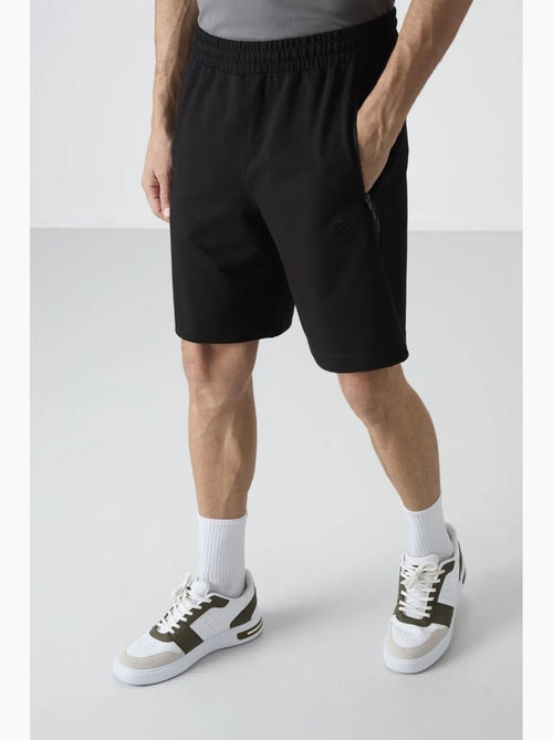 Short de survêtement homme en maille, coupe regular tommy - Kiabi Short de survêtement homme en maille, coupe regular tommy - Kiabi