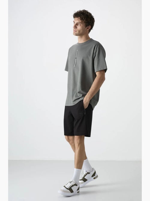 Short de survêtement homme en maille, coupe regular tommy - Kiabi Short de survêtement homme en maille, coupe regular tommy - Kiabi