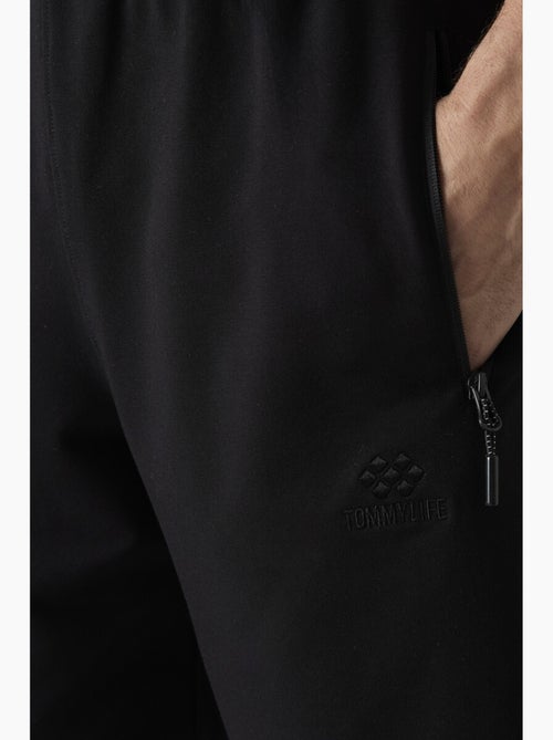 Short de survêtement homme en maille, coupe regular tommy - Kiabi Short de survêtement homme en maille, coupe regular tommy - Kiabi