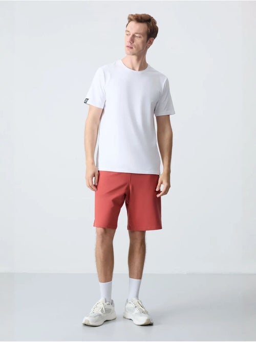 Short de survêtement homme en maille, coupe regular tommy - Kiabi Short de survêtement homme en maille, coupe regular tommy - Kiabi