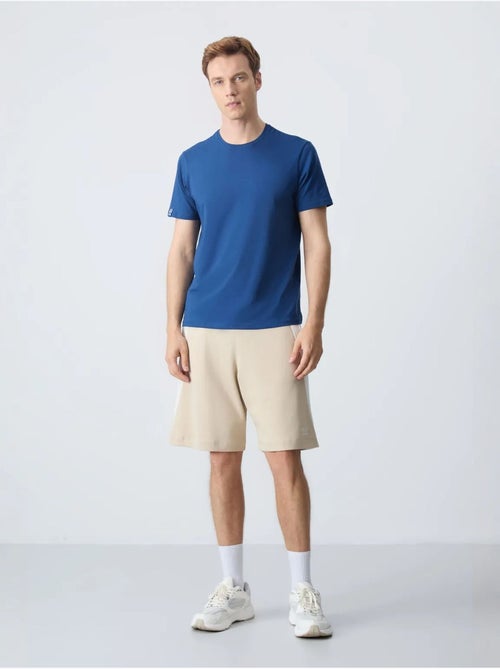 Short de survêtement homme en mélange de coton tommy - Kiabi Short de survêtement homme en mélange de coton tommy - Kiabi