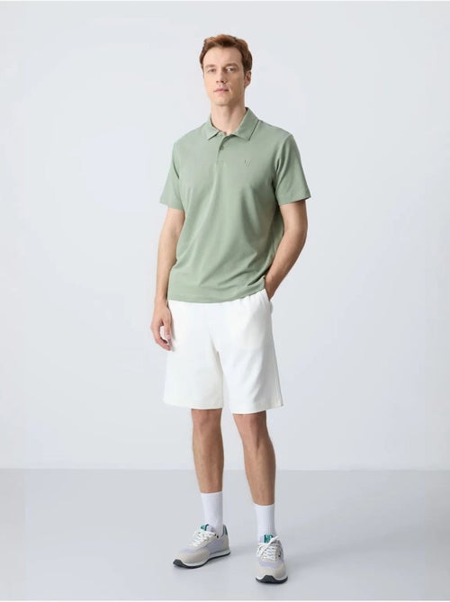 Short de survêtement homme en mélange de coton tommy - Kiabi Short de survêtement homme en mélange de coton tommy - Kiabi