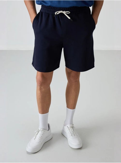 Short de survêtement homme en mélange de coton tommy - Kiabi Short de survêtement homme en mélange de coton tommy - Kiabi