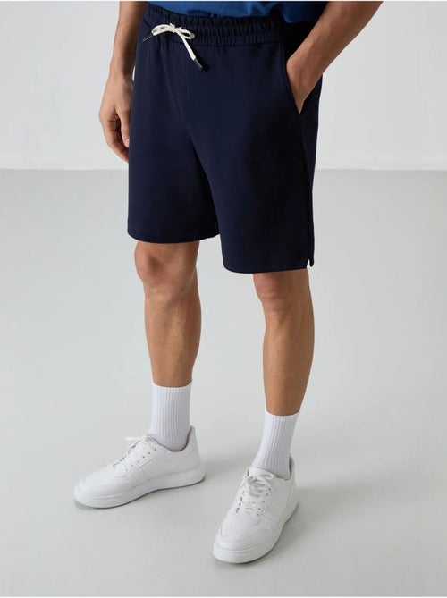 Short de survêtement homme en mélange de coton tommy - Kiabi Short de survêtement homme en mélange de coton tommy - Kiabi