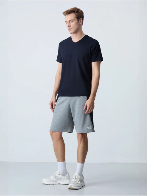 Short de survêtement homme en mélange de coton tommy - Kiabi Short de survêtement homme en mélange de coton tommy - Kiabi