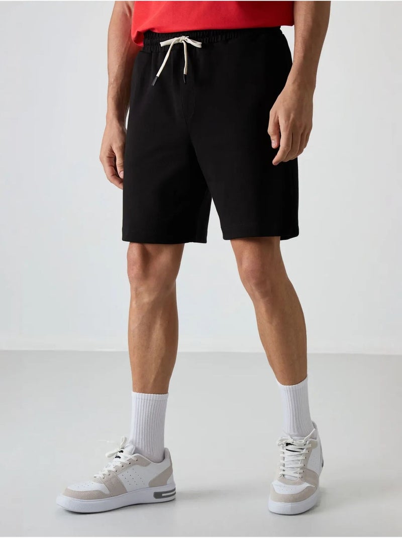 Short de survêtement homme en mélange de coton tommy Noir - Kiabi