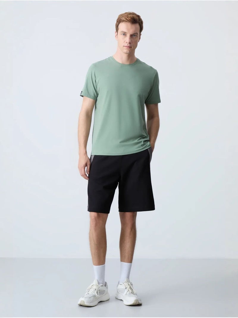 Short de survêtement homme en mélange de coton tommy Noir - Kiabi