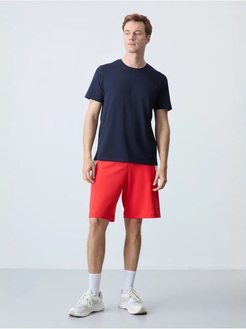 Short de survêtement homme en mélange de coton tommy - Kiabi Short de survêtement homme en mélange de coton tommy - Kiabi