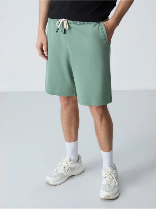 Short de survêtement homme en mélange de coton tommy - Kiabi Short de survêtement homme en mélange de coton tommy - Kiabi
