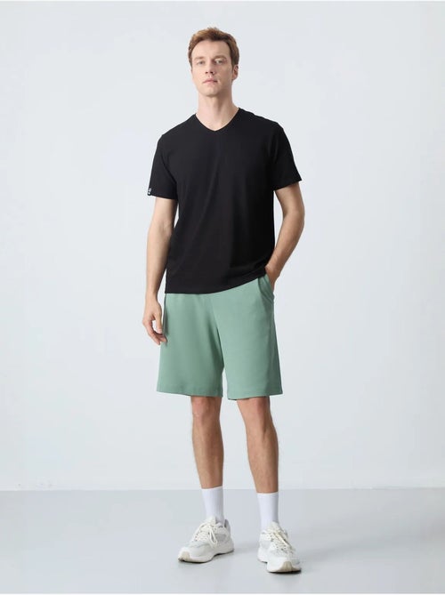 Short de survêtement homme en mélange de coton tommy - Kiabi Short de survêtement homme en mélange de coton tommy - Kiabi