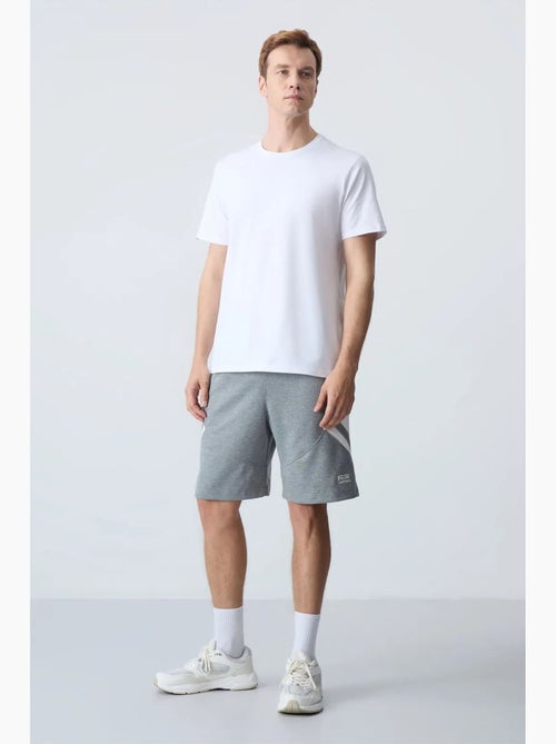 Short de survêtement homme en molton tommy - Kiabi Short de survêtement homme en molton tommy - Kiabi