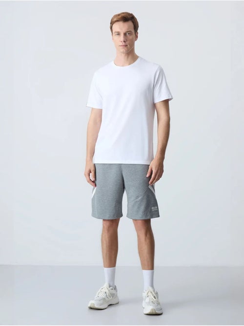 Short de survêtement homme en molton tommy - Kiabi Short de survêtement homme en molton tommy - Kiabi