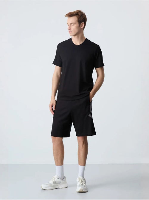 Short de survêtement homme en molton tommy - Kiabi Short de survêtement homme en molton tommy - Kiabi
