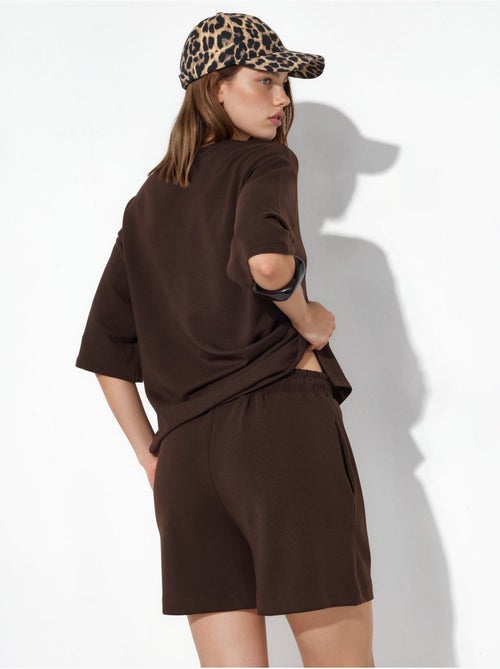 Short de survêtement taille mi-haute à cordon busem - Kiabi Short de survêtement taille mi-haute à cordon busem - Kiabi