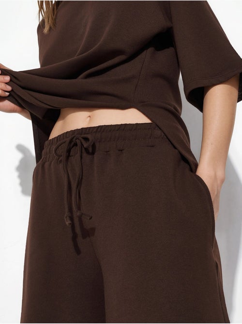 Short de survêtement taille mi-haute à cordon busem - Kiabi Short de survêtement taille mi-haute à cordon busem - Kiabi