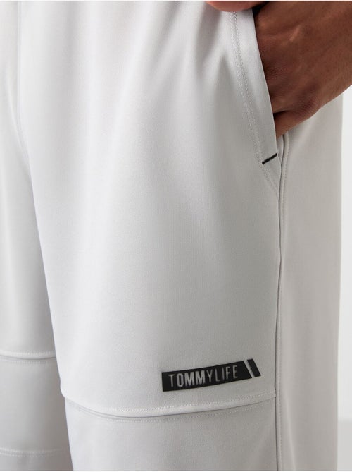 Short de survêtement uni homme tommy - Kiabi Short de survêtement uni homme tommy - Kiabi