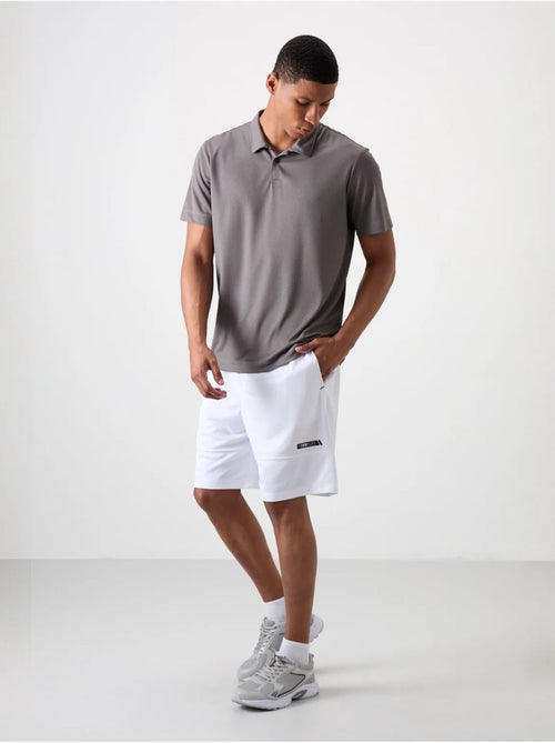Short de survêtement uni homme tommy - Kiabi Short de survêtement uni homme tommy - Kiabi
