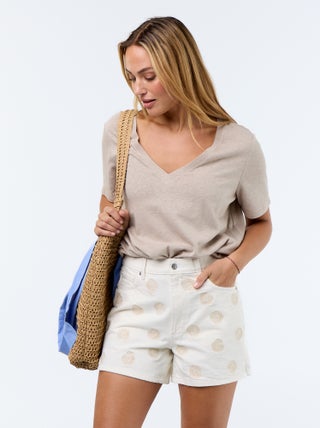 Short denim avec motifs brodés