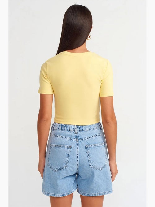 Short en denim à taille haute et jambe large dilvin - Kiabi Short en denim à taille haute et jambe large dilvin - Kiabi
