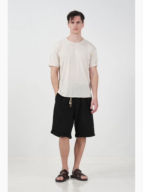 Short en lin mi-haut à jambes larges et poches giesto - Kiabi Short en lin mi-haut à jambes larges et poches giesto - Kiabi
