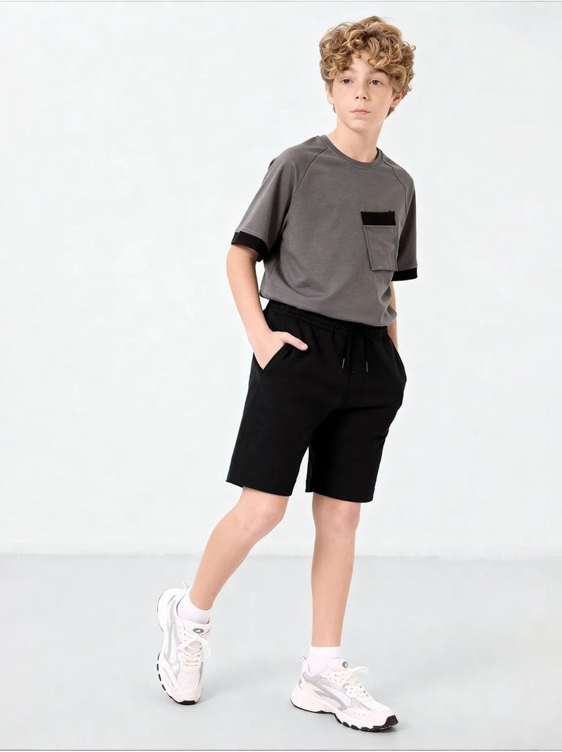 Short en mélange de coton pour jeune tommy Noir - Kiabi