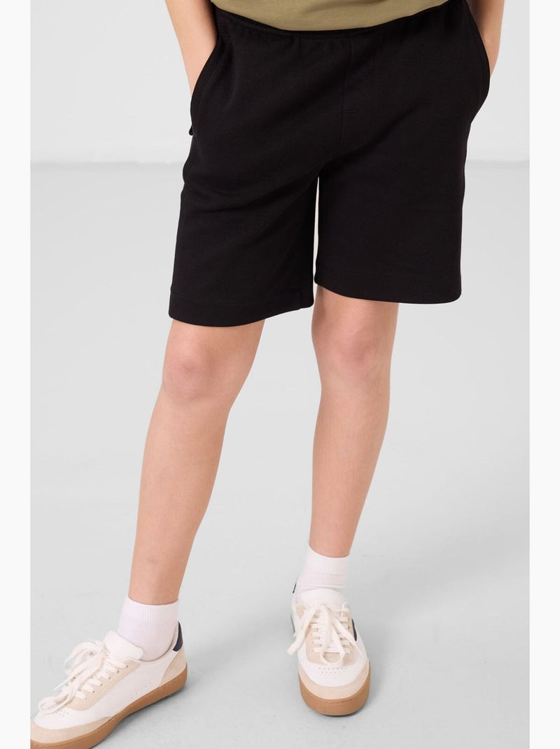 Short en mélange de coton tommy Noir - Kiabi