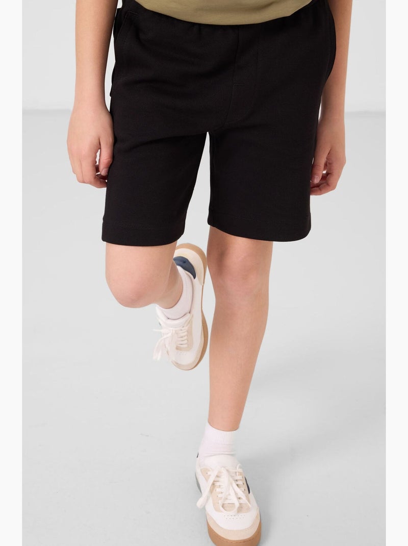Short en mélange de coton tommy Noir - Kiabi