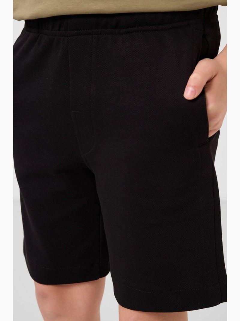 Short en mélange de coton tommy Noir - Kiabi