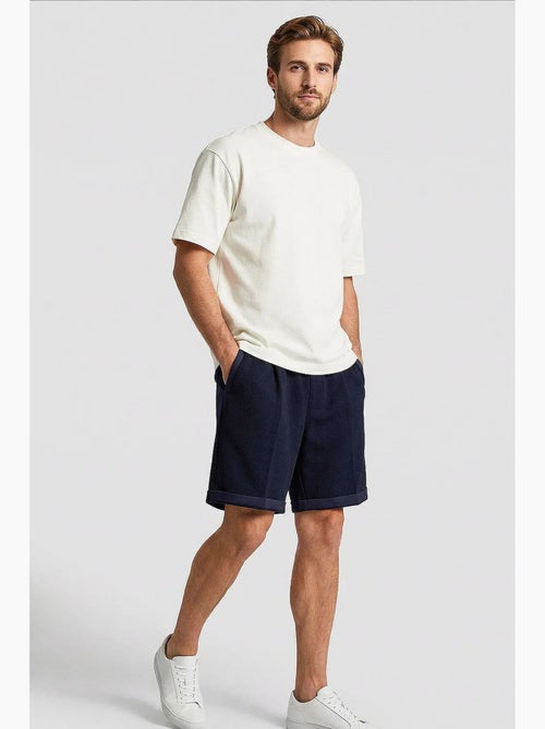Short homme à taille mi-haute et jambes larges tommy - Kiabi Short homme à taille mi-haute et jambes larges tommy - Kiabi
