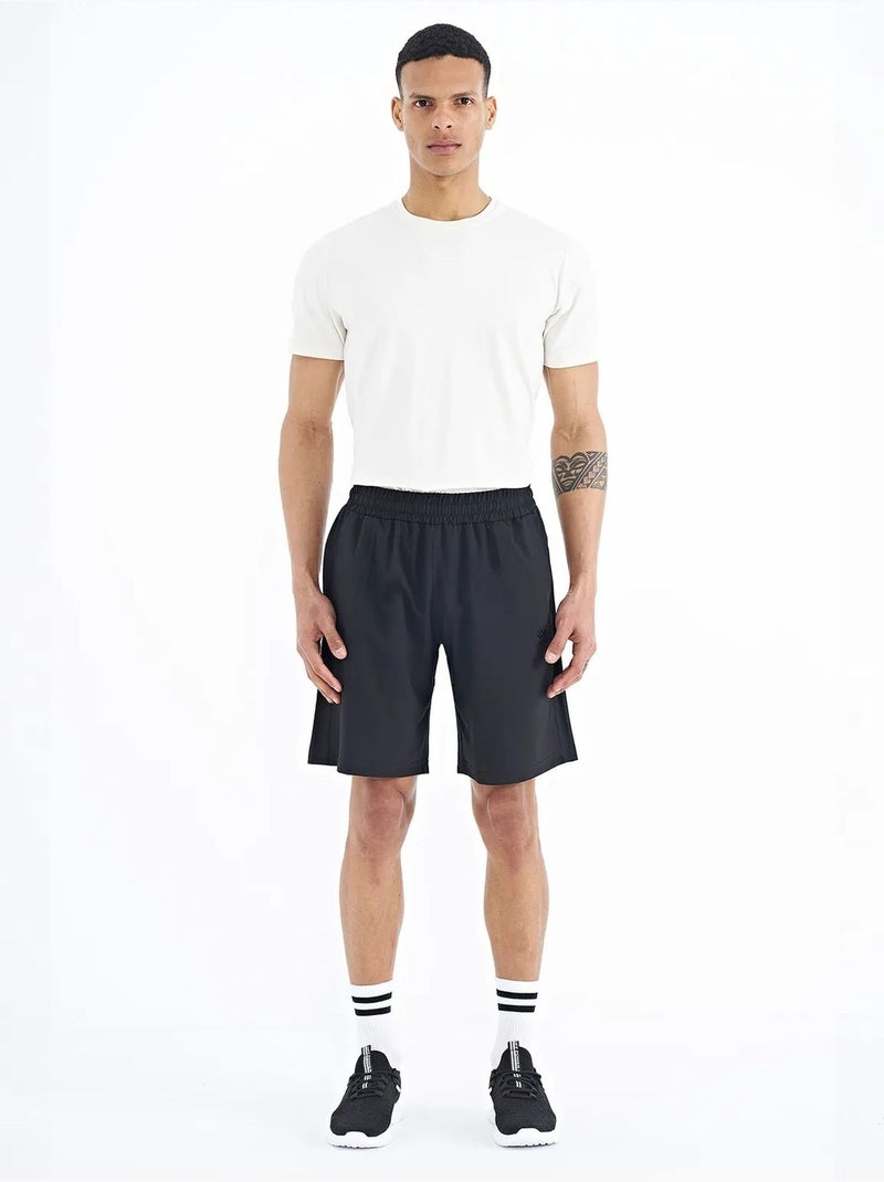 Short homme coupe regular, jambe large tommy Noir - Kiabi